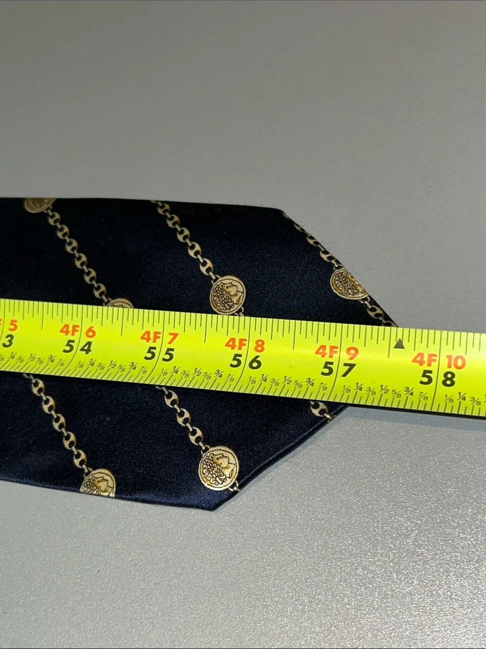 Men's Navy Blue Silk Tie with Gold Coin Chain Motif soft smooth texture